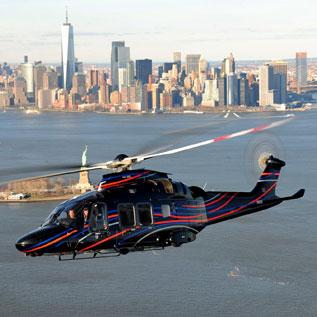 VIP helicopter flies over New York City, with Manhattan skyline in the background